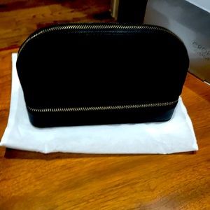 Croft Avenue cosmetics and jewelry travel case with dust bag.